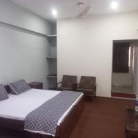 Palms View Hotel，位于费萨拉巴德Faisalabad International Airport - LYP附近的酒店