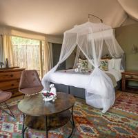 Umkumbe Bush Lodge - Luxury Tented Camp，位于斯库库扎斯库库扎机场 - SZK附近的酒店