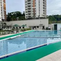 Cozy Condo in Clark Pampanga with Free Parking & Pool Access，位于Mabalacat的酒店