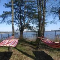 Nad samą wodą własna deska SUP grill altana hamaki ognisko BRZÓZKI 2 miejsce dla max 6 osób i dwójki dzieci - jedna sypialnia z małymi łóżkami，位于Barkowice的酒店