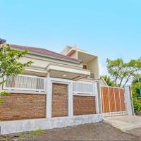 Kanggo Riko Family Homestay Mitra Reddoorz，位于外南梦Banyuwangi的酒店