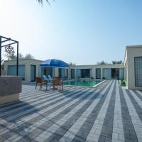 Farm Al Medfek，位于拉斯阿尔卡麦拉斯海玛国际机场 - RKT附近的酒店