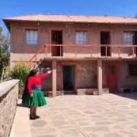 Home in Taquile - Q'uñi wasi，位于Huillanopampa的酒店