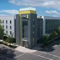 尤金市中心大学区希尔顿欣庭套房酒店，位于尤金的酒店