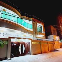 Cosy Inn Guest House Near Millennium Mall，位于卡拉奇Gulshan-E-Jamal的酒店