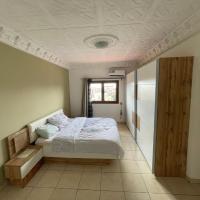Appartement spacieux à Nongo,UNC，位于NongoGbessia Airport - CKY附近的酒店