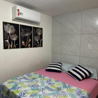 Cantinho aconchegante - Quarto 02 AR-condicionado，位于Bayeux卡斯特罗平托总统国际机场 - JPA附近的酒店