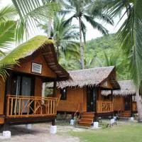 Ocam Ocam Mission Inn and Ocean-View Cottages，位于New Busuanga的酒店