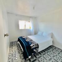 Private Double Room - Airport Cottage，位于Fua‘amotu努库阿罗法国际机场 - TBU附近的酒店