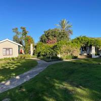 Farmlands Guesthouse，位于乔治乔治机场 - GRJ附近的酒店