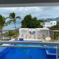Sun on the bay beach hotel，位于欧卡帕尔马的酒店