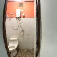 N&R House，位于帝力尼古洛·巴托总统国际机场 - DIL附近的酒店