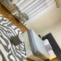 Quartos privados em uma casa comum，位于卢班戈Lubango - SDD附近的酒店