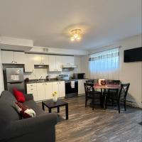 Charmant appartement au sous-sol，位于隆格伊蒙特利尔/圣休伯特机场 - YHU附近的酒店