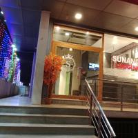 HOTEL SUNANDA LODGE，位于贝尔高姆贝尔高姆机场 - IXG附近的酒店