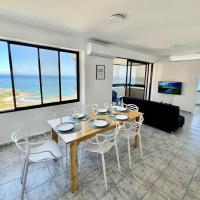 Amazing apt ocean view, 10 min Airport，位于迈克蒂亚西蒙·玻利瓦尔国际机场 - CCS附近的酒店