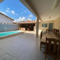Casa em Guaratinguetá-Casa da Rosa，位于瓜拉廷格塔瓜拉廷桂塔机场 - GUJ附近的酒店
