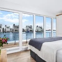 5 Beaufort - Wasserhaus, Meerblick, Sauna, Dachterrasse, Bootsanleger, Strandkorb，位于奥尔本尼兹的酒店