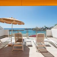 Apartment in Playa de Mog&aacute;n by the Beach，位于莫甘的酒店