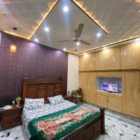 Gulistan Inn，位于费萨拉巴德Faisalabad International Airport - LYP附近的酒店