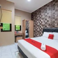 Urbanview Syariah Hotel Tiga ER near Karawang Central Plaza，位于加拉旺的酒店