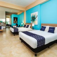 Capital O Cancun International Airport 24 7，位于坎昆坎昆国际机场 - CUN附近的酒店