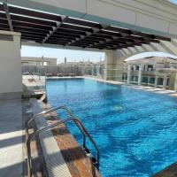 OYO HOME 1382 Spacious 1 BHK With Balcony，位于阿布扎比阿布扎比国际机场 - AUH附近的酒店