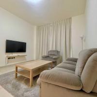 OYO HOME 1401 '1 Br With Spacious Rooms View Towards Airport，位于阿布扎比阿布扎比国际机场 - AUH附近的酒店