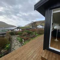 Cosy house with stunning view，位于瑟沃格Vágar - FAE附近的酒店
