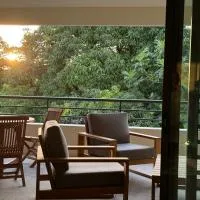 Arbre a pain Beach Lodge，位于普纳奥亚的酒店