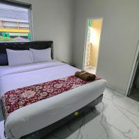 Joy Hotel，位于HajimanaRadin Inten II Airport - TKG附近的酒店