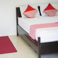 OYO 93784 Kost Bu Eli Syariah，位于玛琅阿卜杜勒拉赫曼萨利赫机场 - MLG附近的酒店