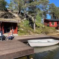 Sommeridyll i vannkanten，位于Bygland的酒店