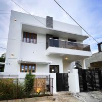 Hexahub Homestay and Hospitality Services Near Trichy Airport，位于Tiruchirappalli蒂鲁吉拉帕利国际机场 - TRZ附近的酒店