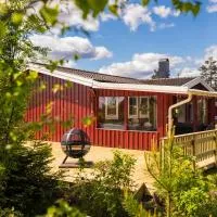 Långrösta; Ruime blokhut grenzend aan bos，位于哈格福什的酒店