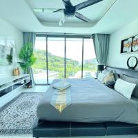 Twin Sands Resort Penthouse，位于芭东海滩的酒店