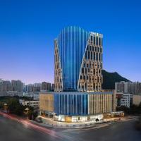 Hilton Garden Inn Xingyi Orange Hill Plaza，位于兴义Xingyi Wanfenglin Airport - ACX附近的酒店