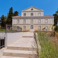 Captain' s Villa Boutique Hotel，位于大洛希尼的酒店