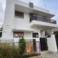 Hexahub Homestay and Hospitality Services，位于蒂鲁奇奇拉帕利蒂鲁吉拉帕利国际机场 - TRZ附近的酒店