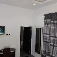The Marble Hotel and Apartments，位于乌约Calabar Airport - CBQ附近的酒店