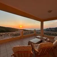 Villa Avra Arillas sunsets and large pool，位于阿里拉斯的酒店