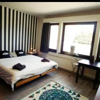 Homestay La Montagne des Coeurs，位于Eigenbilzen的酒店