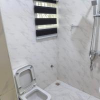 Dearest service apartments，位于Mofoluku穆尔塔拉·穆罕默德国际机场 - LOS附近的酒店