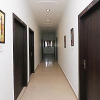 Hotel O Mid Town Ojus Tower，位于鲁德拉普尔潘特纳加机场 - PGH附近的酒店