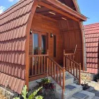 Ekas Rising Coffee And Cottages，位于Ekas的酒店