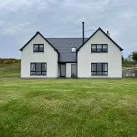 Tigh an Fhearainn B&B Low Road Portskerra Melvich Thurso KW14 7YL,位于瑟索的酒店