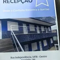Ap2 30 minutos de gramado com vaga e ar condicionado centro igrejinha，位于伊格雷日尼亚的酒店