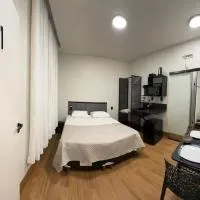 1Studio ao lado da Praça Augusto Silva, PRÓXIMO À UFLA E UNILAVRAS，位于拉夫拉斯的酒店