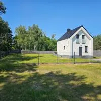 Leśny Zakątek Świączyń Jacuzzi, sauna, ognisko,位于Świączyn的酒店