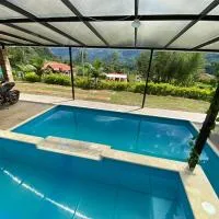 Piscina Privada, Zona parrillas, 8 min del Pueblo, Parqueadero Cubierto，位于帕乔的酒店